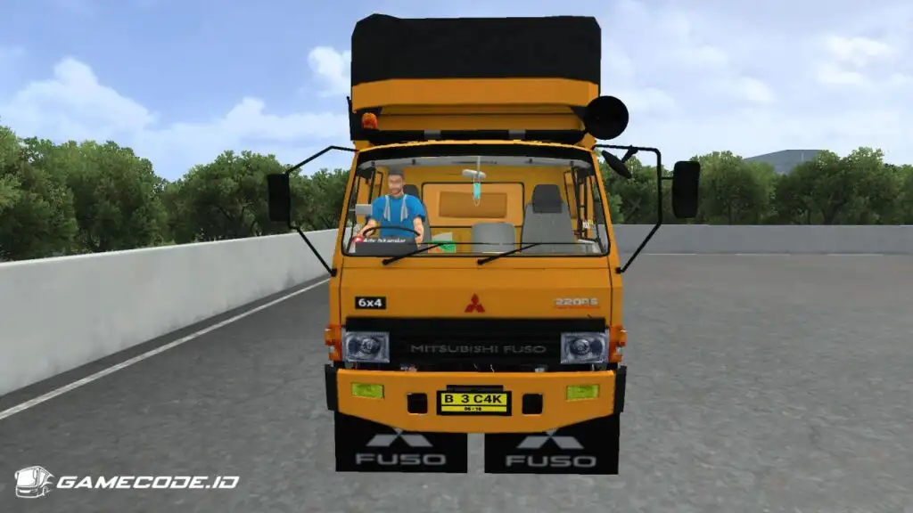 tampilan truk fuso fn bak tribal dari depan