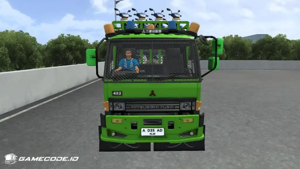 tampilan truk fuso fn motor carrier dari depan