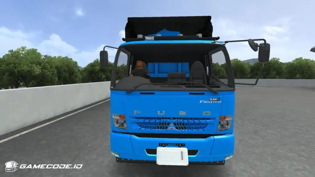 tampilan truk fuso fighter dump dari depan