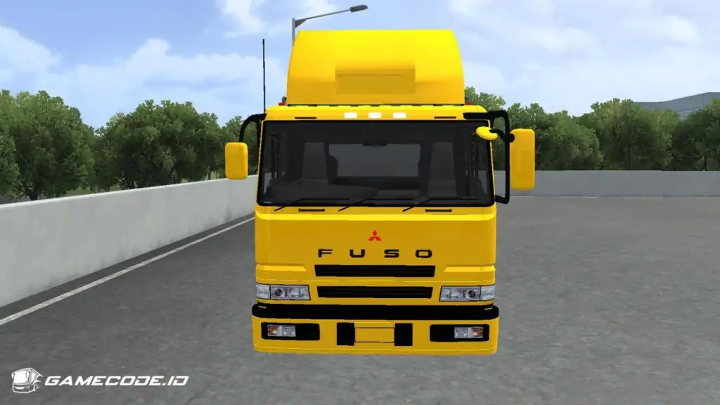 tampilan truk fuso sg tribal bermuatan dari depan