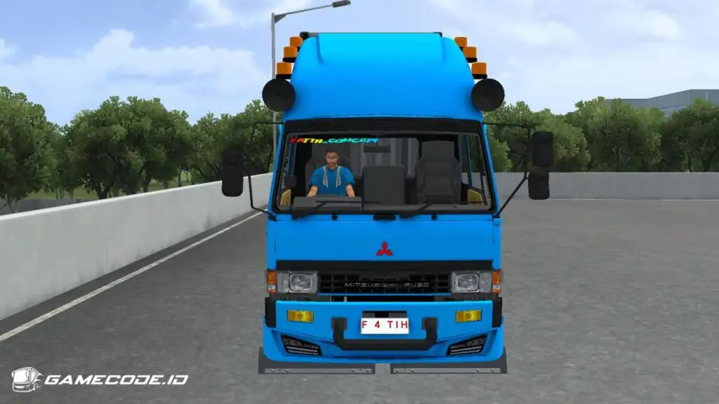 tampilan truk fuso fighter kontainer dari depan