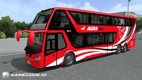 Bus tingkat merah-hitam dengan logo singa dan tulisan Double Decker di kaca samping