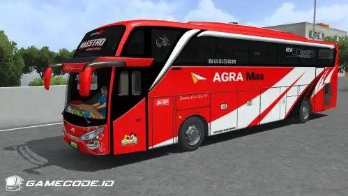 Bus merah-putih dengan tulisan Maestro di kaca depan dan kaca samping gelap
