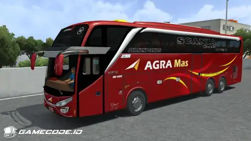 Livery Agra Mas bernuansa merah dengan detail minimalis